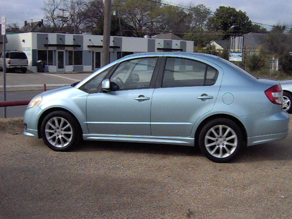 2009 BLUE /Grey Suzuki SX4 Sport Base (JS2YC414296) with an 2.0L L4 DOHC 16V engine, automatic transmission, located at 2425 Franklin Ave., Waco, TX, 76701, (254) 753-6661, 31.540359, -97.148682 - Photo #0