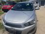 2016 SILVER /BLACK Chevrolet Sonic LT HATCHBACK 5-Door (1G1JC6SG6G4) with an 1.8L L4 DOHC 24V engine, 6A transmission, located at 2425 Franklin Ave., Waco, TX, 76701, (254) 753-6661, 31.540359, -97.148682 - NICE GAS SAVER HATCHBACK FOR STUDENT OR FAMILY. WE CAN SUGGEST A LOCAL LENDER FOR POSSIBLE FINANCING. - Photo#0