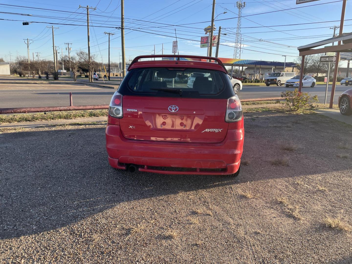 2006 Red /BLACK Toyota Matrix 2WD (2T1KR30E66C) with an 1.8L L4 DOHC 16V engine, AUTOMATIC transmission, located at 2425 Franklin Ave., Waco, TX, 76701, (254) 753-6661, 31.540359, -97.148682 - NICE GAS SAVER WITH ONLY 131,896 MILES - IT'S A TOYOTA ! MODEL XR SPORT WAGON. DON' T DRAG YOUR FEET ON THIS ONE - WON'T LAST LONG. - Photo#4