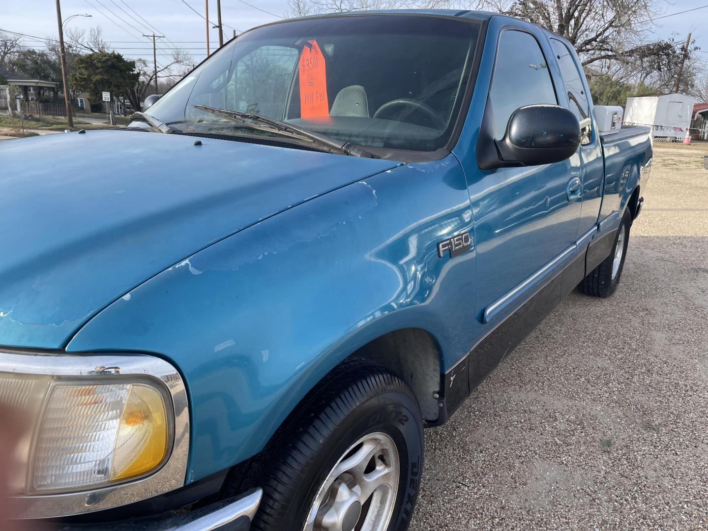 1997 TEAL /GREY Ford F-150 SuperCab Long Bed 2WD (1FTDX1765VK) with an 4.6L V8 SOHC 16V engine, AUTOMATIC transmission, located at 2425 Franklin Ave., Waco, TX, 76701, (254) 753-6661, 31.540359, -97.148682 - GOOD WORK TRUCK, NOT FANCY, TOOLBOX, BEDLINER, PAINT NOT PERFECT, CLEAN TITLE. - Photo#1