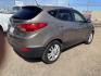 2013 Bronze /Black Hyundai Tucson Limited 2WD (KM8JU3AC9DU) with an 2.4L L4 DOHC 16V engine, 6-Speed Automatic transmission, located at 2425 Franklin Ave., Waco, TX, 76701, (254) 753-6661, 31.540359, -97.148682 - Very nice Hyundai Tucson Limited, cold AC, only 100K, Weather Tech floor mats, good tires, tint. See at Massey Motors, we can suggest a lender if you need financing. Priced below book value, out the door price includes TTL AND FEES. $8628.49 total- Photo#1