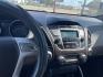 2013 Bronze /Black Hyundai Tucson Limited 2WD (KM8JU3AC9DU) with an 2.4L L4 DOHC 16V engine, 6-Speed Automatic transmission, located at 2425 Franklin Ave., Waco, TX, 76701, (254) 753-6661, 31.540359, -97.148682 - Very nice Hyundai Tucson Limited, cold AC, only 100K, Weather Tech floor mats, good tires, tint. See at Massey Motors, we can suggest a lender if you need financing. Priced below book value, out the door price includes TTL AND FEES. $8628.49 total- Photo#7