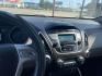 2013 Bronze /Black Hyundai Tucson Limited 2WD (KM8JU3AC9DU) with an 2.4L L4 DOHC 16V engine, 6-Speed Automatic transmission, located at 2425 Franklin Ave., Waco, TX, 76701, (254) 753-6661, 31.540359, -97.148682 - Very nice Hyundai Tucson Limited, cold AC, only 100K, Weather Tech floor mats, good tires, tint. See at Massey Motors, we can suggest a lender if you need financing. Priced below book value, out the door price includes TTL AND FEES. $8628.49 total- Photo#9