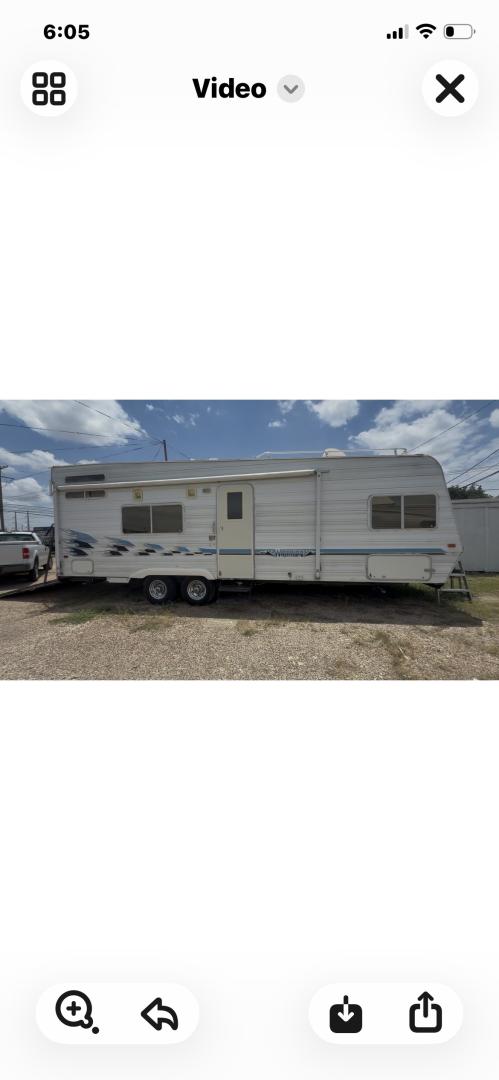 2004 WHITE Weekend Warrior Trailers Inc WEEKEND WARRIOR TOY HAULER - (5HRFF26204C) , located at 2425 Franklin Ave., Waco, TX, 76701, (254) 753-6661, 31.540359, -97.148682 - 2004 WEEKEND WARRIOR 2600 FS TOY HAULER equiped with Fuel Station, Onan 5500 Generator, cold A/C, Huge Basement Storage, 4 Beds sleeps 6 or more, Microwave, cold 8 Cubic Ft. Refrigerator, Oven and Stove Top, Solar Panel, Well taken care of and ready for your fun vacation or camping trip. Bumper P- Photo#0