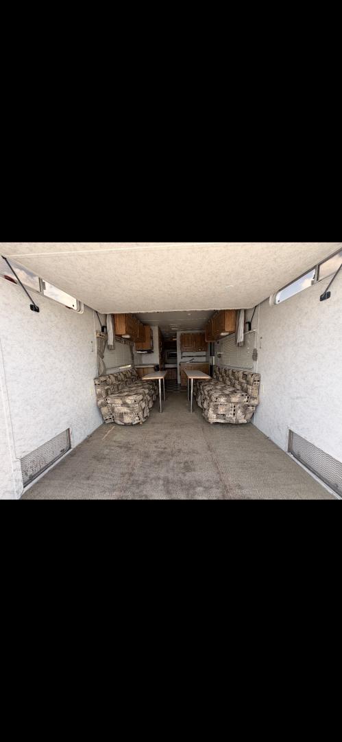 2004 WHITE Weekend Warrior Trailers Inc WEEKEND WARRIOR TOY HAULER - (5HRFF26204C) , located at 2425 Franklin Ave., Waco, TX, 76701, (254) 753-6661, 31.540359, -97.148682 - 2004 WEEKEND WARRIOR 2600 FS TOY HAULER equiped with Fuel Station, Onan 5500 Generator, cold A/C, Huge Basement Storage, 4 Beds sleeps 6 or more, Microwave, cold 8 Cubic Ft. Refrigerator, Oven and Stove Top, Solar Panel, Well taken care of and ready for your fun vacation or camping trip. Bumper P- Photo#1