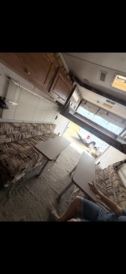 2004 WHITE Weekend Warrior Trailers Inc WEEKEND WARRIOR TOY HAULER - (5HRFF26204C) , located at 2425 Franklin Ave., Waco, TX, 76701, (254) 753-6661, 31.540359, -97.148682 - 2004 WEEKEND WARRIOR 2600 FS TOY HAULER equiped with Fuel Station, Onan 5500 Generator, cold A/C, Huge Basement Storage, 4 Beds sleeps 6 or more, Microwave, cold 8 Cubic Ft. Refrigerator, Oven and Stove Top, Solar Panel, Well taken care of and ready for your fun vacation or camping trip. Bumper P- Photo#9