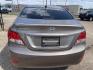 2014 Gold /Tan Hyundai Accent GLS 4-Door (KMHCT4AEXEU) with an 1.6L L4 DOHC 16V engine, Automatic transmission, located at 2425 Franklin Ave., Waco, TX, 76701, (254) 753-6661, 31.540359, -97.148682 - Gas Saver 27/38 mpg, drives great, cosmetic hail dmg, no ck engine lights, cold a/c, reg oil changes, highway ready. See at Massey Motors, 2425 Franklin, Waco. Call 254-753-6661 for test drive appointment.- Photo#4
